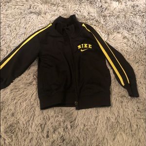 Nike zip up toddler shirt.